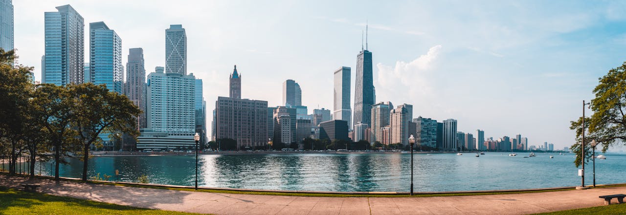 services-02 Stunning panoramic view of Chicago's skyline from the waterfront, showcasing iconic skyscrapers and urban beauty.